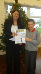 Rebecca Shippam with the prize winner from St Bernard's RC Primary School